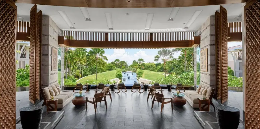 Sofitel Bali Nusa Dua Beach Resort's lobby offers a beautiful view of the golf course, showcasing the essence of a Bali resort all-inclusive.