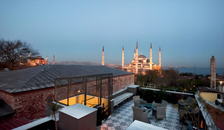 Rooftop terrace showcasing a picturesque view of the Blue Mosque at a boutique hotel in Istanbul