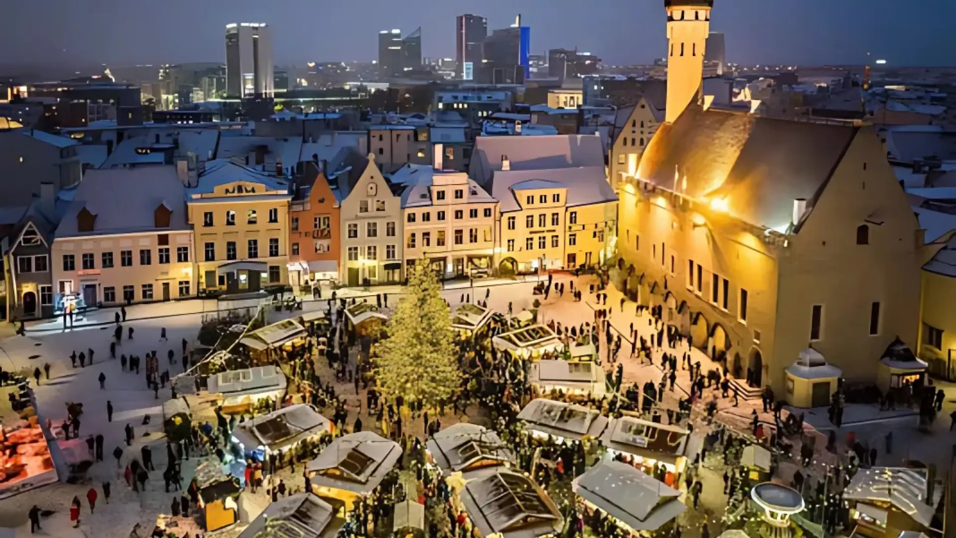 A festive scene at the Christmas market in Tallinn, Estonia, showcasing one of the best Christmas markets in Europe.