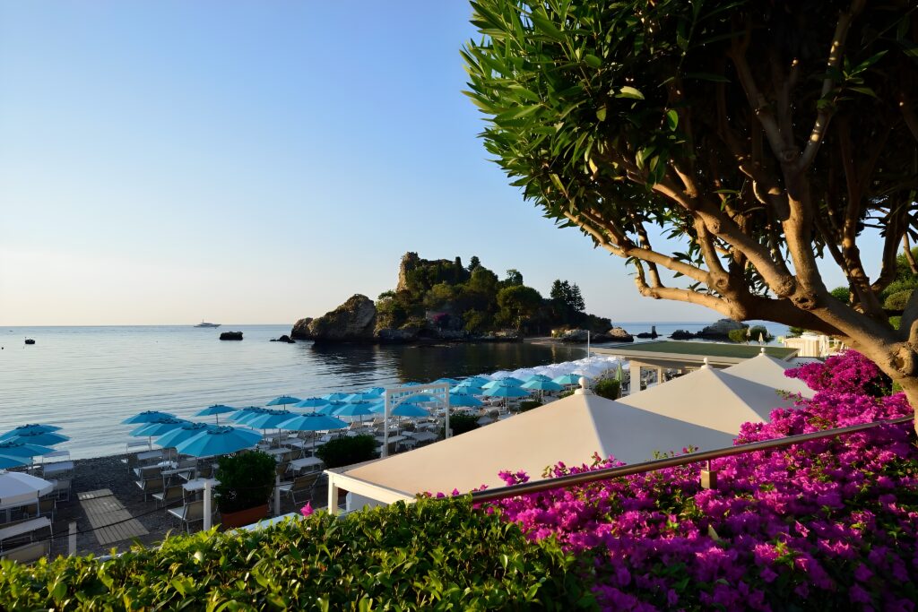 Beautiful beach and sea view from La Plage Resort in Taormina, offering a glimpse of this exclusive hotel in Sicily with private beach.