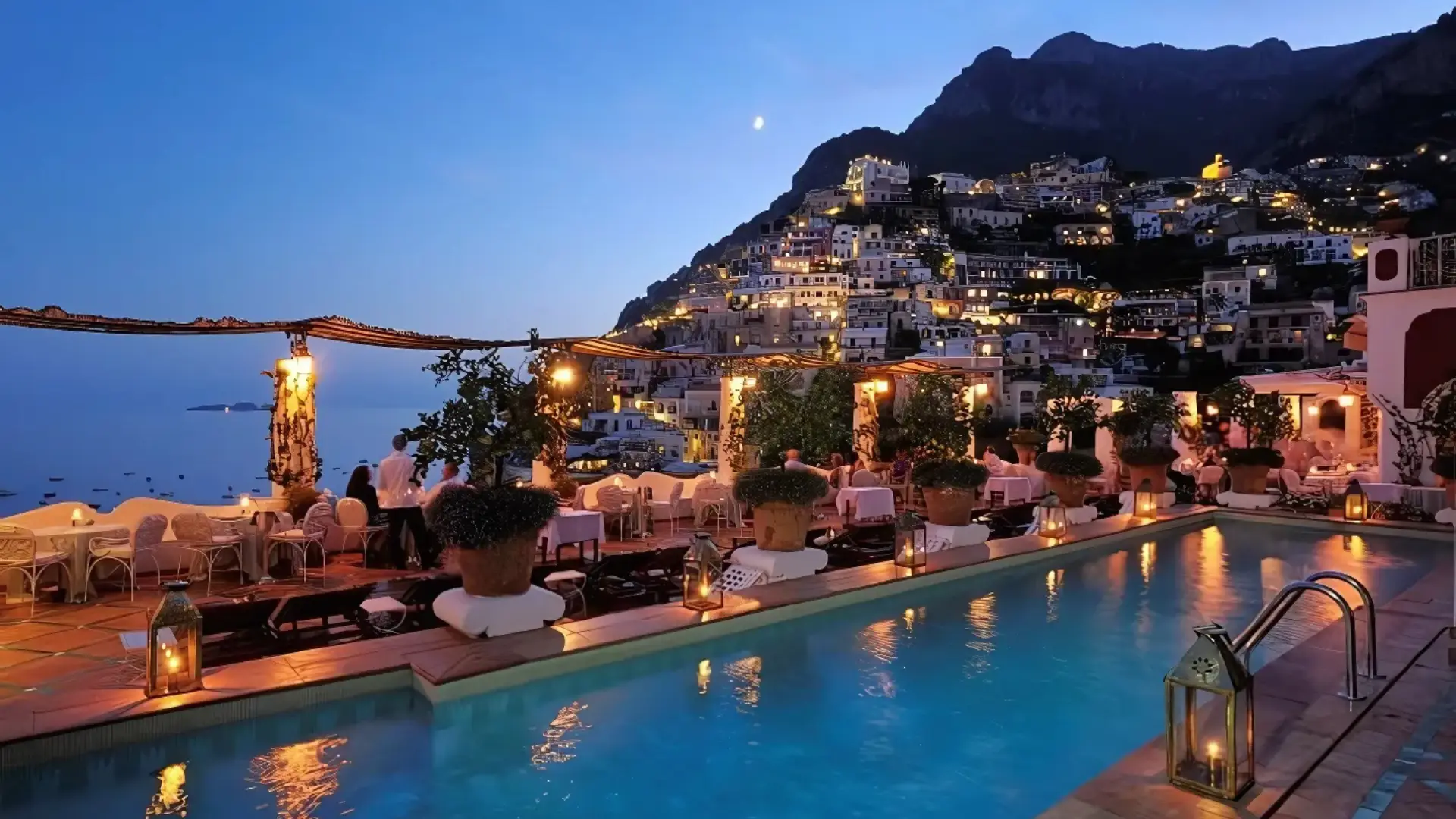 Experience the enchanting evening view at one of the best romantic hotels in Positano, Le Sirenuse.