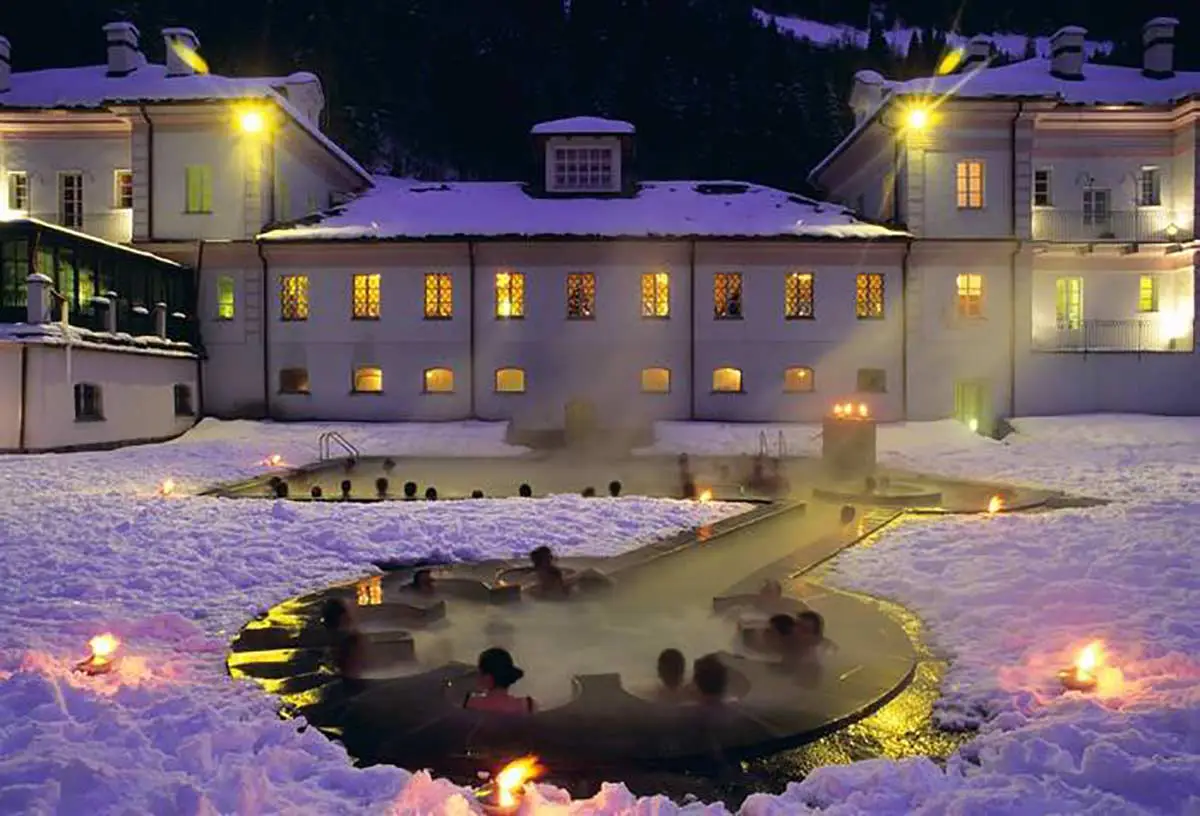 QC Terme Monte Bianco offers a hot tub in the snow, making it one of the best ski hotels in Italy for winter fun.