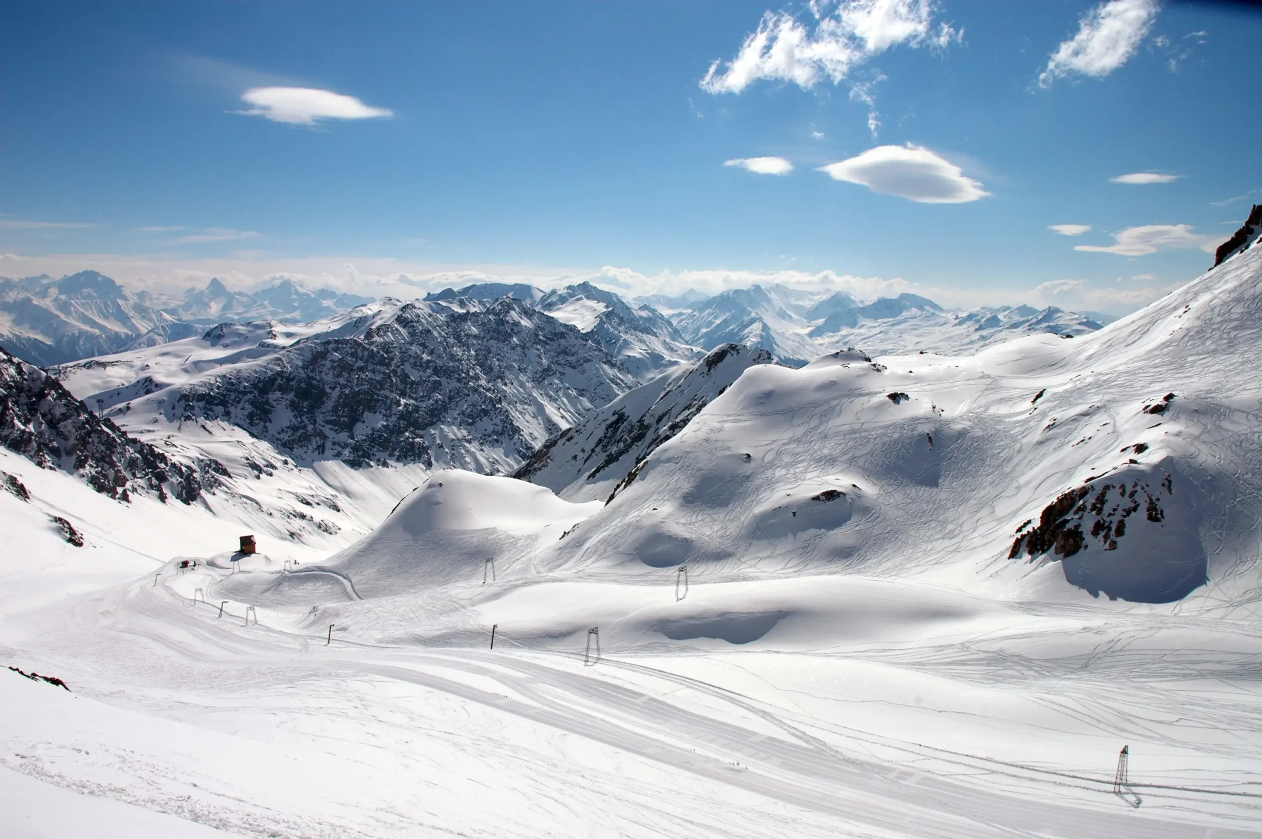 Davos, one of the best ski resorts in Switzerland, features a snowy mountain with a ski slope.