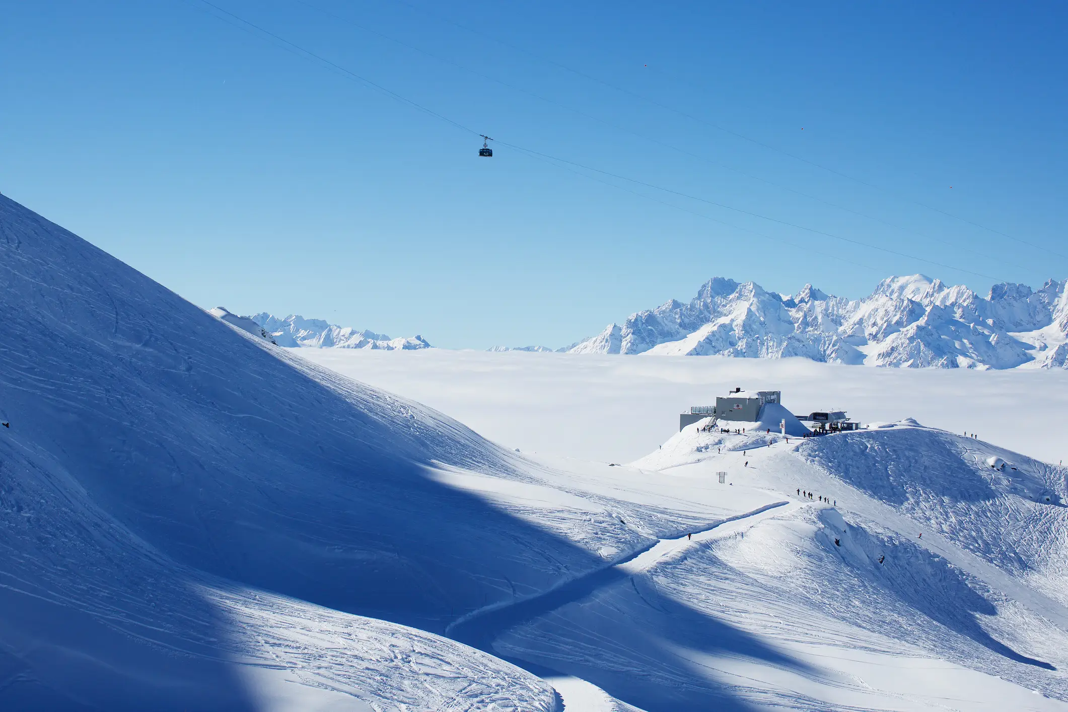 A snowy mountain at Verbier, showcasing one of the best ski resorts in Switzerland, perfect for winter sports lovers.