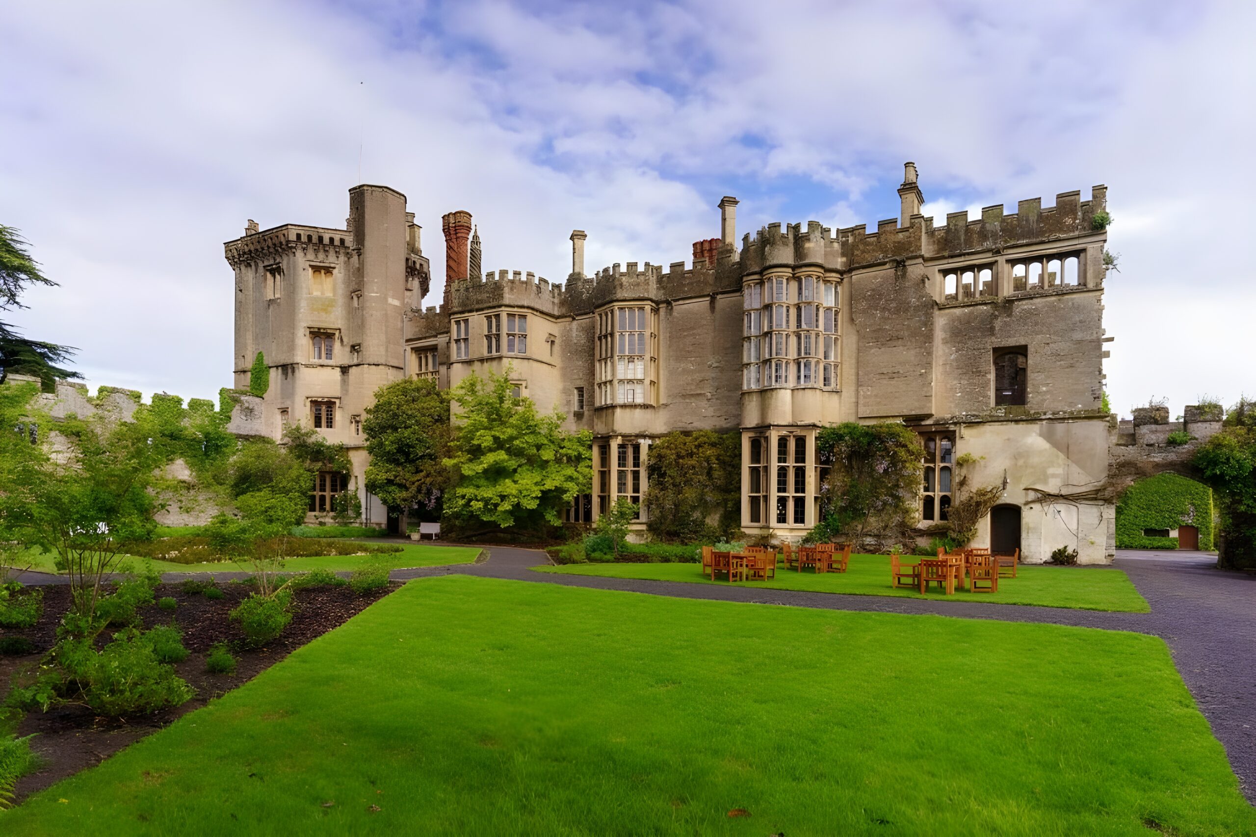 Surrounded by verdant grass, Thornbury Castle, one of the best hotels in the world stands proudly, representing the beauty of England's historic architecture.