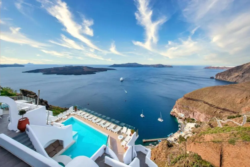 A stunning view of Aegean sea, featuring Athina Luxury Suites, a family-friendly hotel in Santorini with breathtaking scenery.