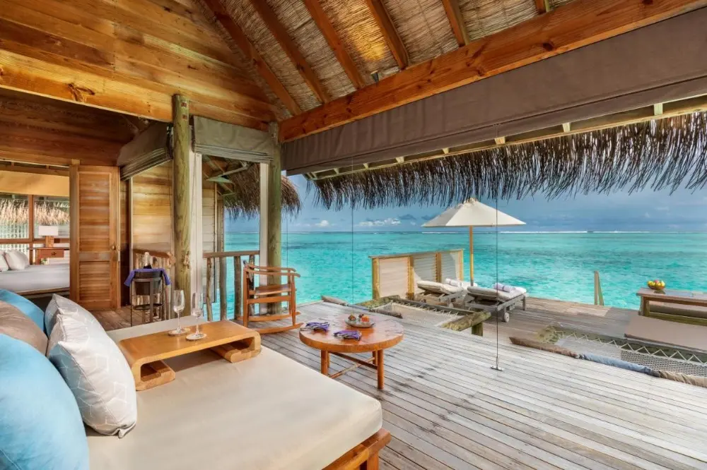 Overwater villa at Gili Lankanfushi, a luxury resort in Maldives Island, showcasing luxury and tranquility in the Maldives' pristine waters.