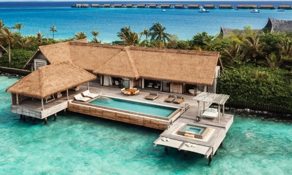 Waldorf Astoria Maldives Ithaafushi, a stunning luxury resort in Maldives Island, features an overwater villa that blends luxury with the natural beauty of the island.