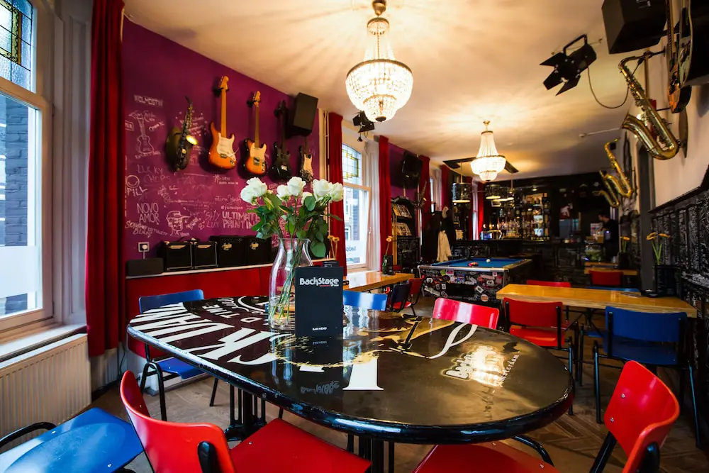 Rock-settled space where people can have a drink and enjoy the time at Backstage Hotel, one of the best music-themed hotels worldwide.