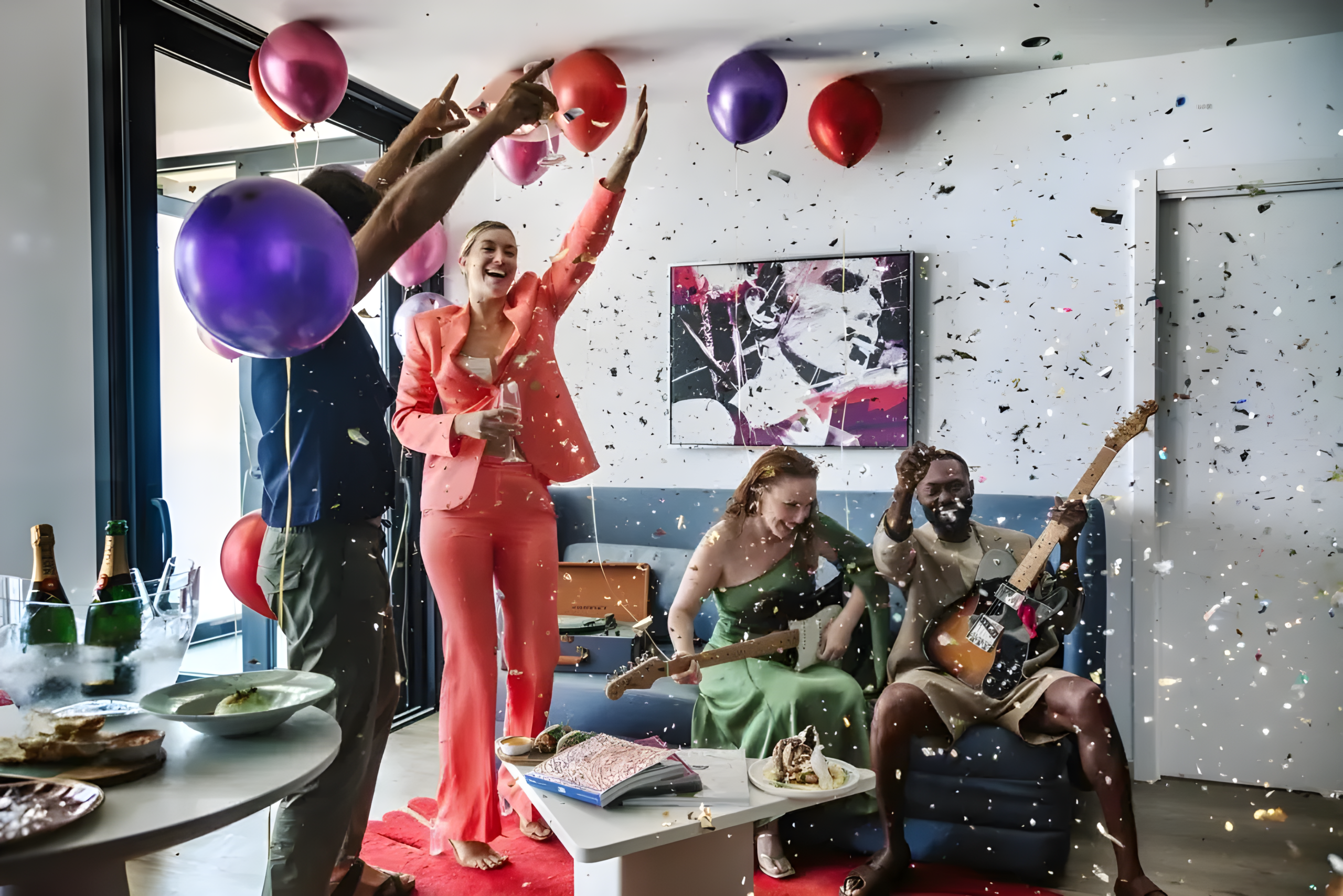 Guests joyfully celebrate in a festive room filled with balloons at the Hard Rock Hotel, one of the best party hotels in Ibiza.