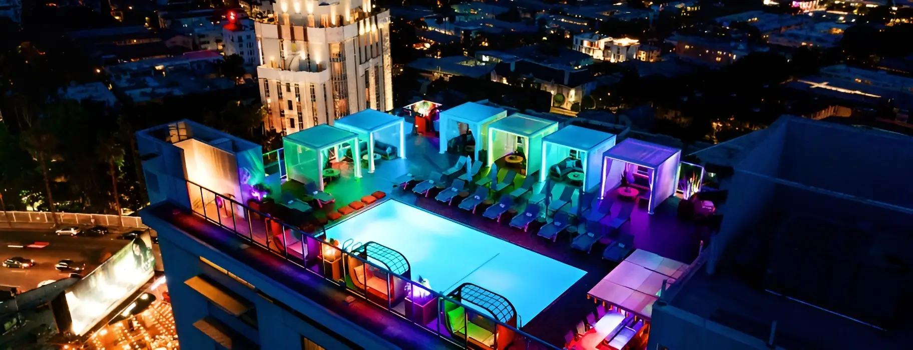 A night party rooftop pool bar at Andaz West Hollywood, one of the best music-themed hotels worldwide.